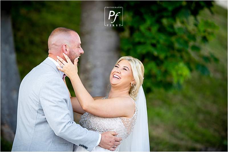 natural wedding with bride and groom having fun