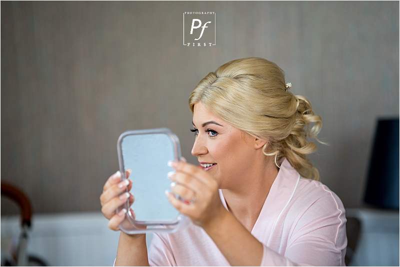 checking wedding makeup  - stradey park hotel wedding