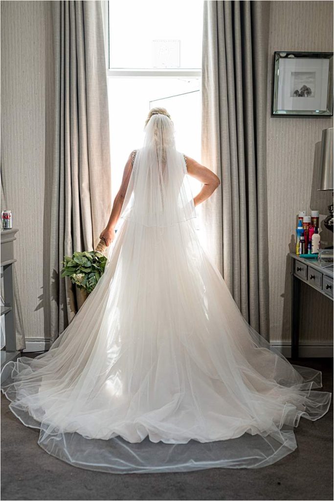 stunning wedding dress taken a bridal suite of stradey park hotel wedding