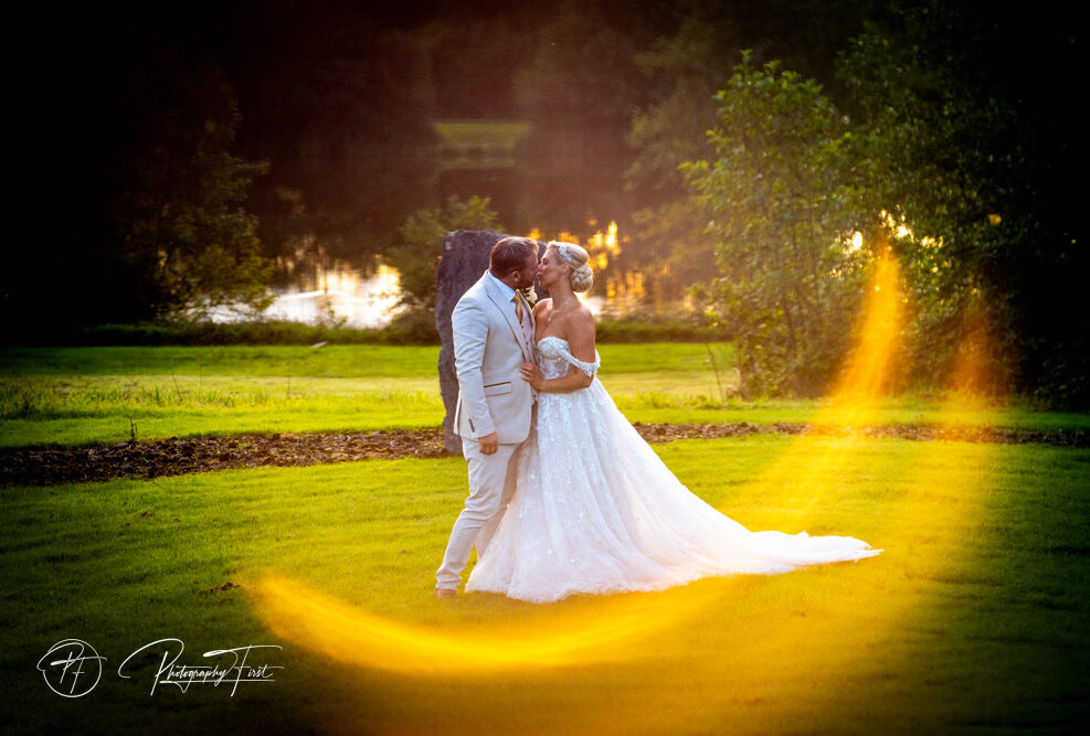Romantic moment between wedding couple at Sylen Lakes